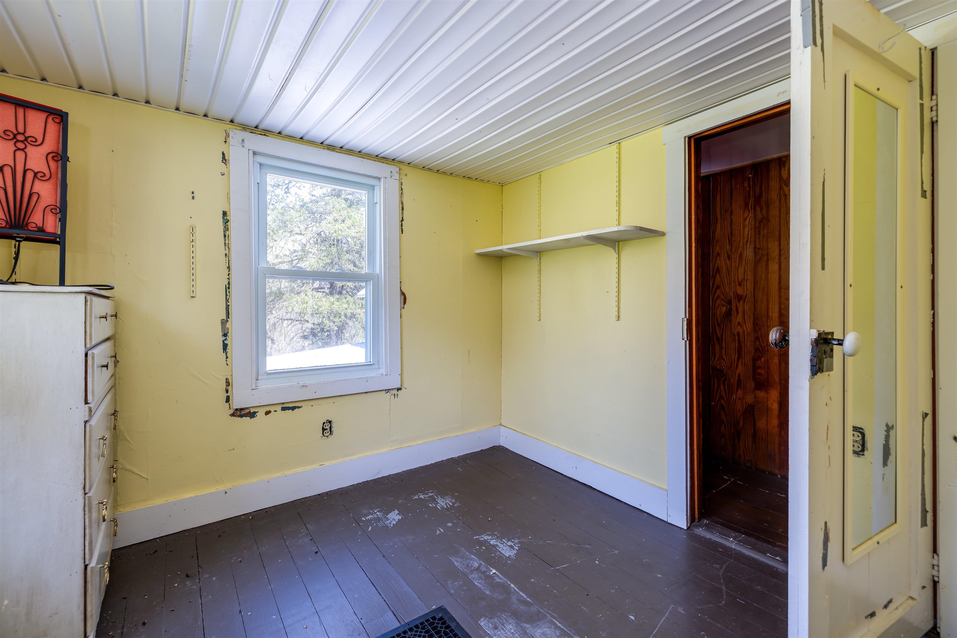 1476 Egypt Bend Road Luray, VA 22835 - Photo 32 of 74 an empty room with wooden floor and a window