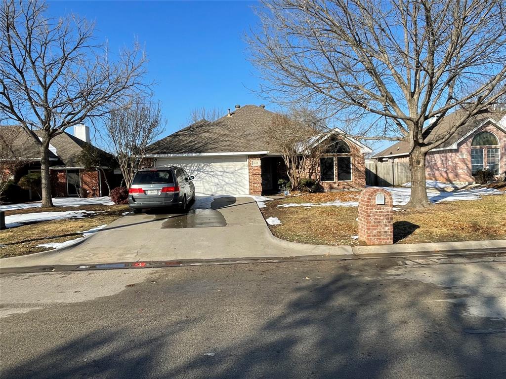 a view of street with houses