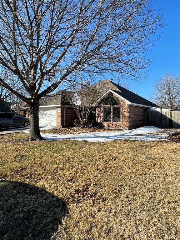 2620 John Drive Denton, TX 76207 - Photo 3 of 3 a house view with a outdoor space
