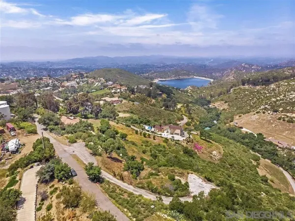 a view of a city with green space