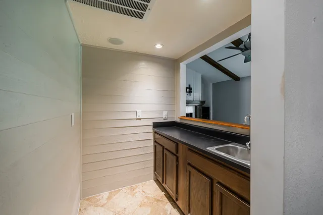 a kitchen with a stove and a microwave