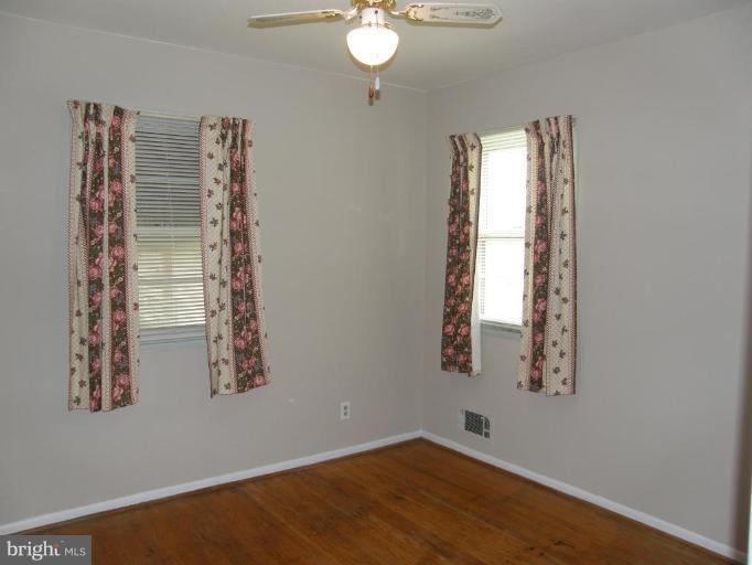 17 West Timonium Road Lutherville-Timonium, MD 21093 - Photo 7 of 17 Second bedroom with fresh, neutral paint.