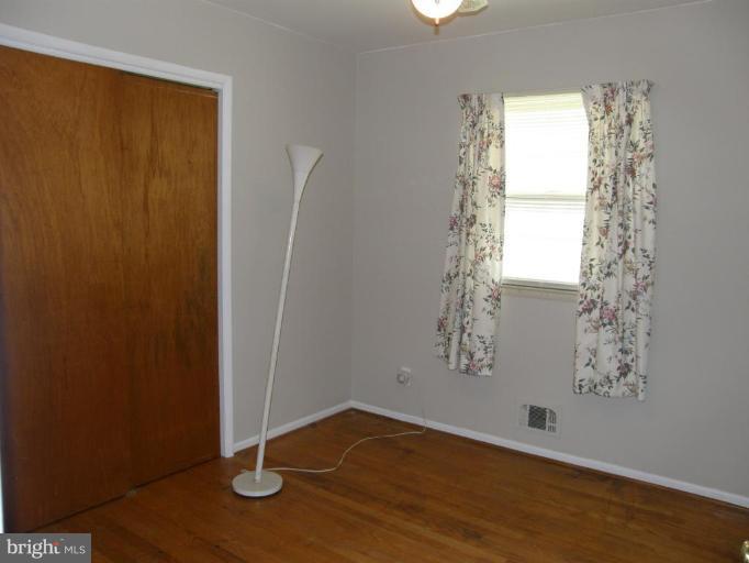 17 West Timonium Road Lutherville-Timonium, MD 21093 - Photo 8 of 17 Third bedroom with fresh, neutral color paint.