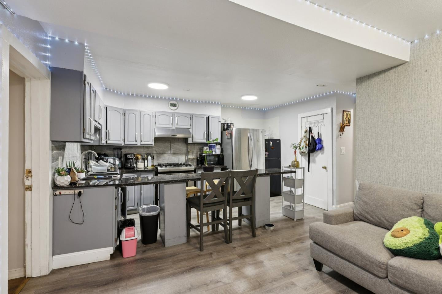 44 Patton Street San Francisco, CA 94110 - Photo 30 of 46 a kitchen with stainless steel appliances granite countertop a refrigerator and a stove top oven