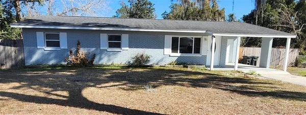 a view of a house with a patio
