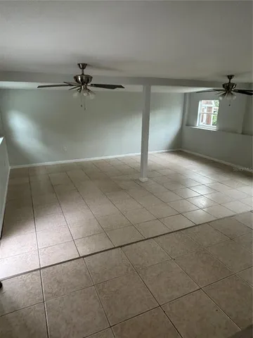 a view of a livingroom and a window