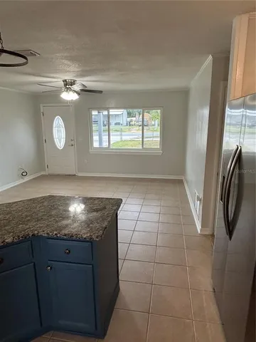 a view of cabinets and wooden floor