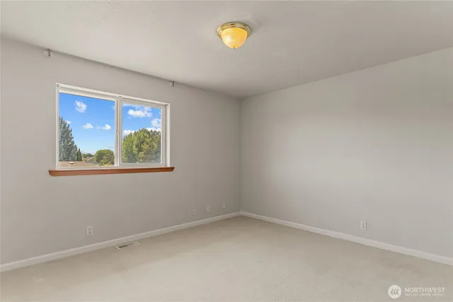 an empty room with closet