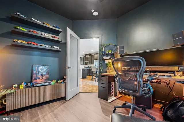 a room with furniture and workspace