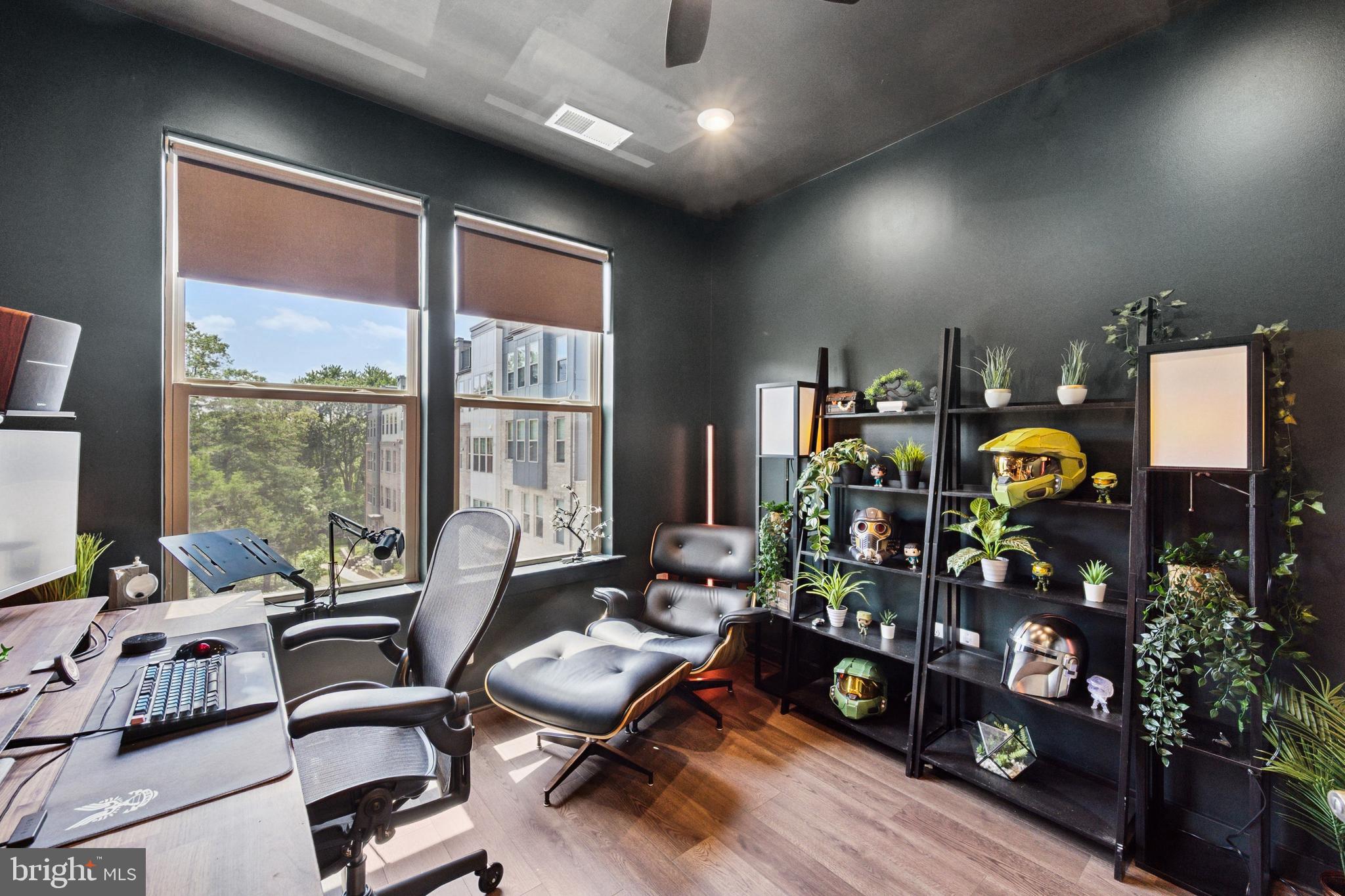 13506 Innovation Station Loop, Unit 2B Herndon, VA 20171 - Photo 15 of 32 a room with gym equipment and a large window