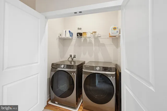 a view of a balcony with furniture
