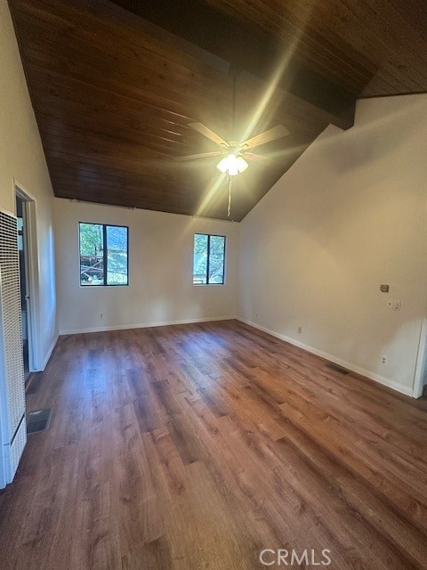 23867 Pioneer Camp Road Crestline, CA 92325 - Photo 16 of 16 an empty room with wooden floor and window