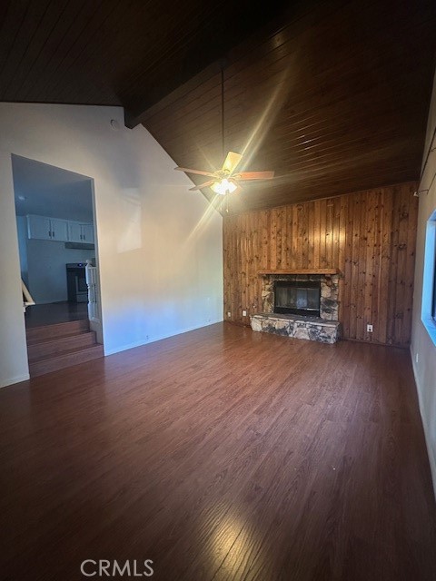 23867 Pioneer Camp Road Crestline, CA 92325 - Photo 2 of 16 a view of a big room with wooden floor a fireplace