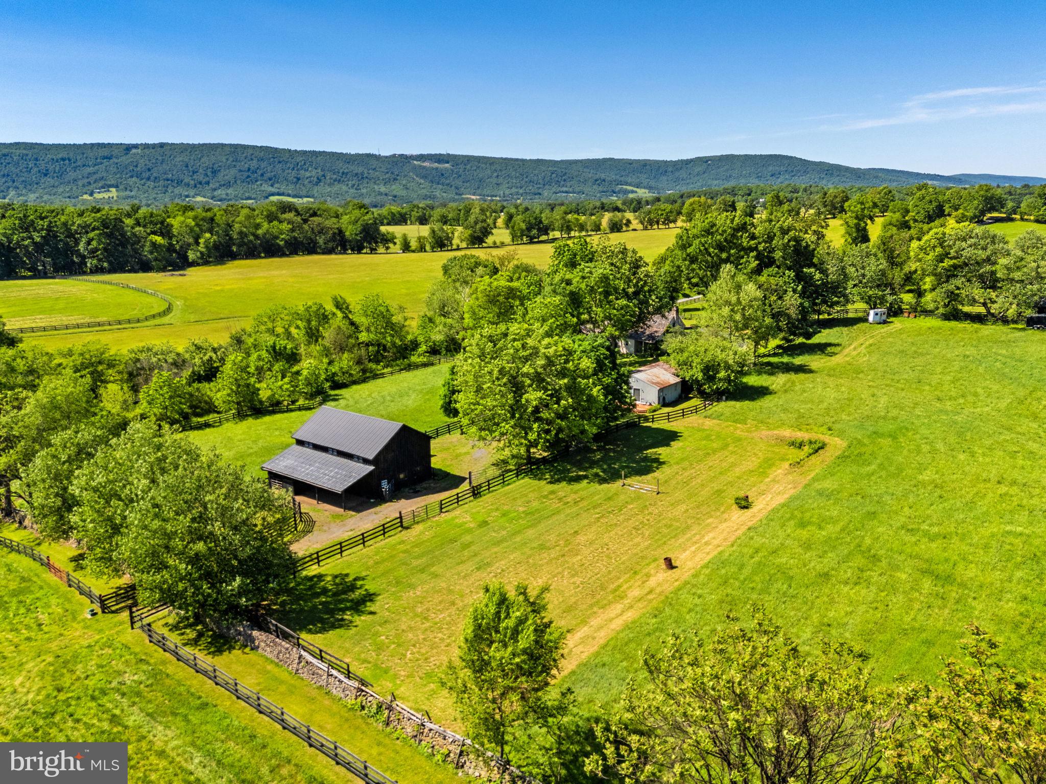 33195 Millville Road Upperville, VA 20184 - Photo 54 of 76 The barn area with Blue Ridge Mtns in background