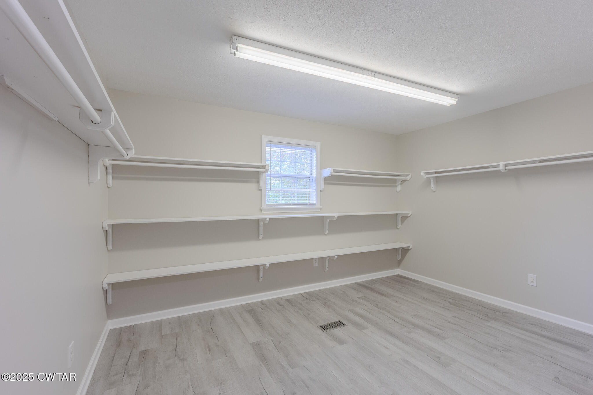 2850 Jeanette Holladay Road Parsons, TN 38363 - Photo 16 of 40 a view of an empty walk in closet