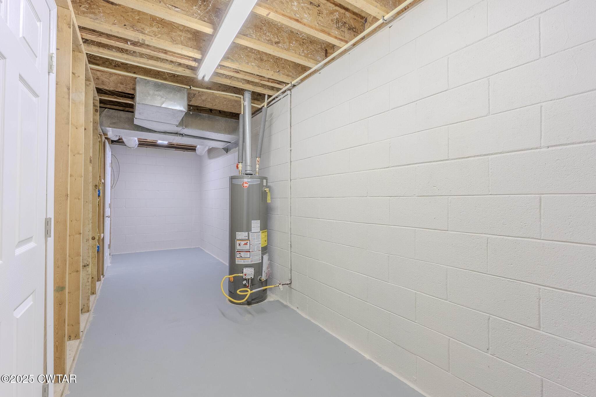 2850 Jeanette Holladay Road Parsons, TN 38363 - Photo 31 of 40 a view of walk in closet with empty racks