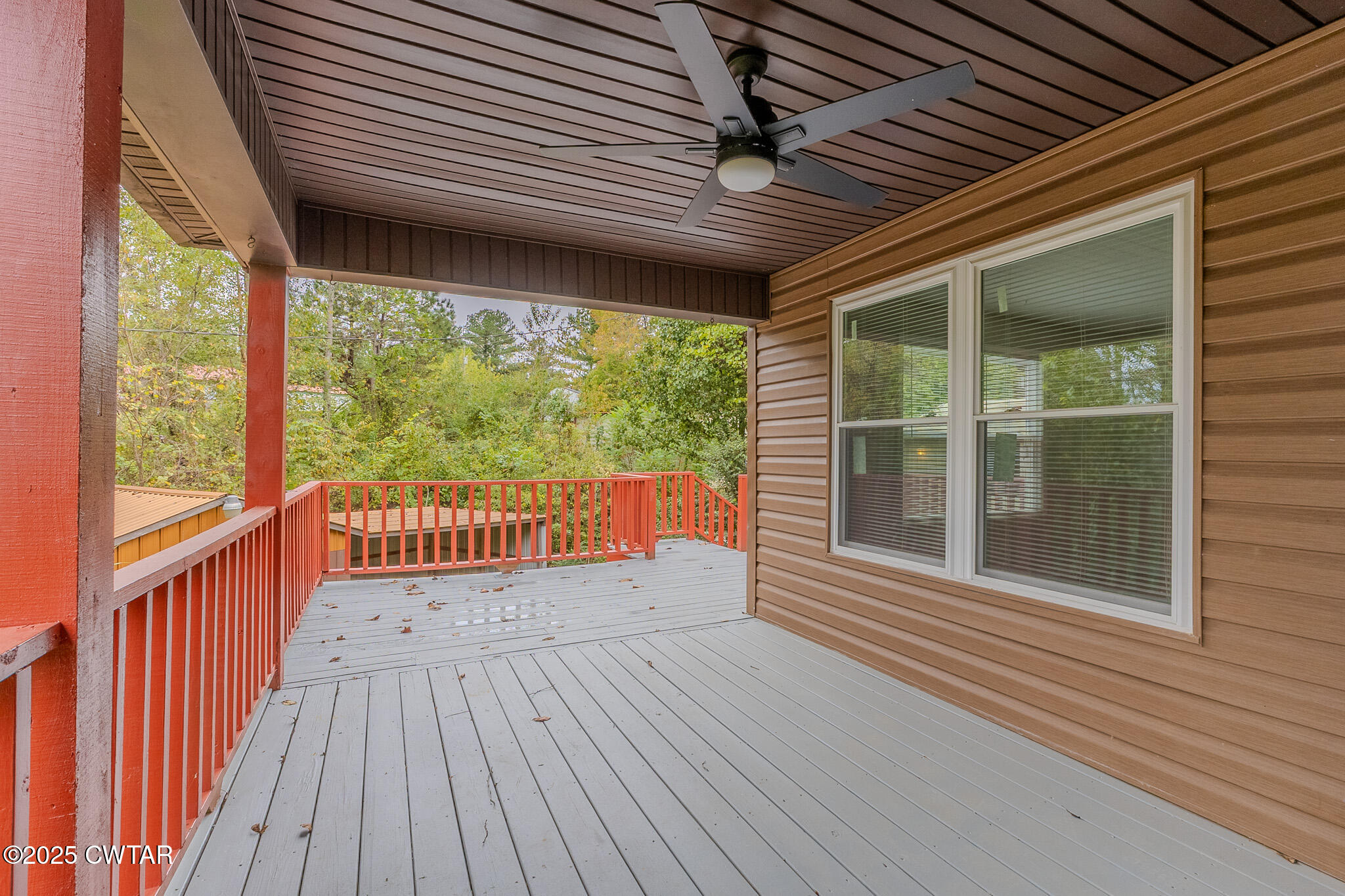 2850 Jeanette Holladay Road Parsons, TN 38363 - Photo 33 of 40 a view of a two room with wooden floor and balcony