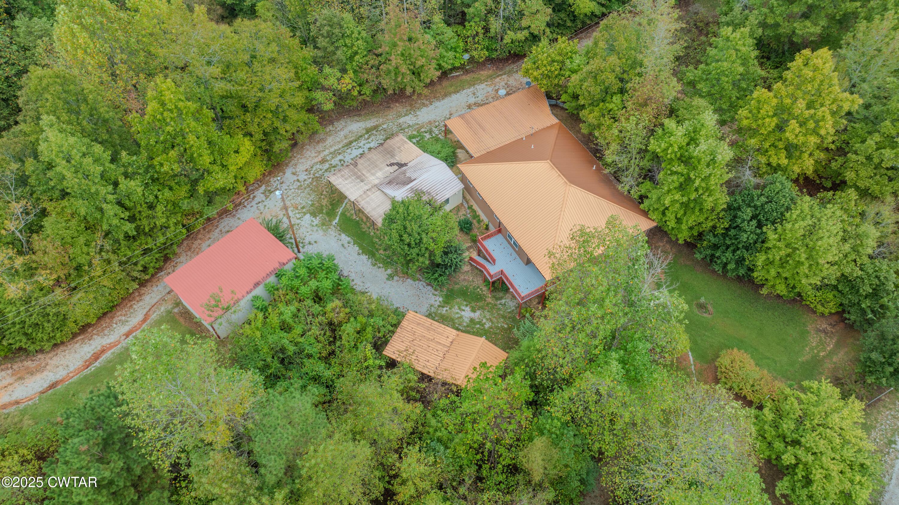 2850 Jeanette Holladay Road Parsons, TN 38363 - Photo 40 of 40 an aerial view of a house with a yard and lake view