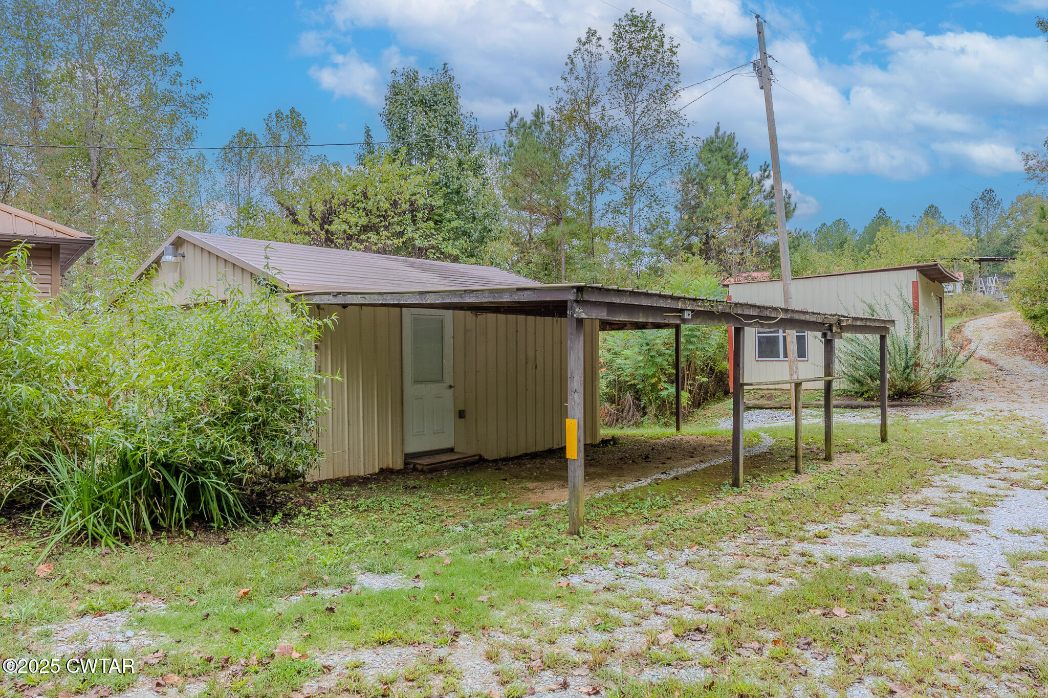 2850 Jeanette Holladay Road Parsons, TN 38363 - Photo 7 of 40 a view of backyard with green space