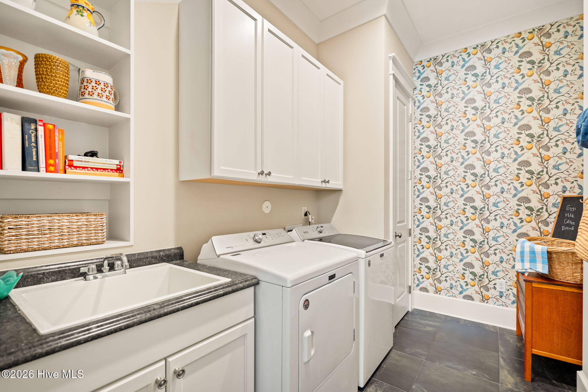 211 Whimbrel Way Hampstead, NC 28443 - Photo 28 of 99 Huge Laundry room with sink and open shelving, cabinets and closet