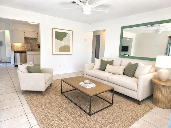 a living room with furniture and a couch