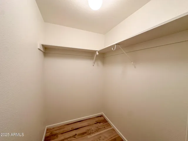 a view of a room with racks on the wall