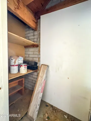 a view of storage and utility room