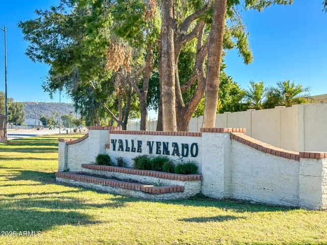 a view of swimming pool with an outdoor space and seating area