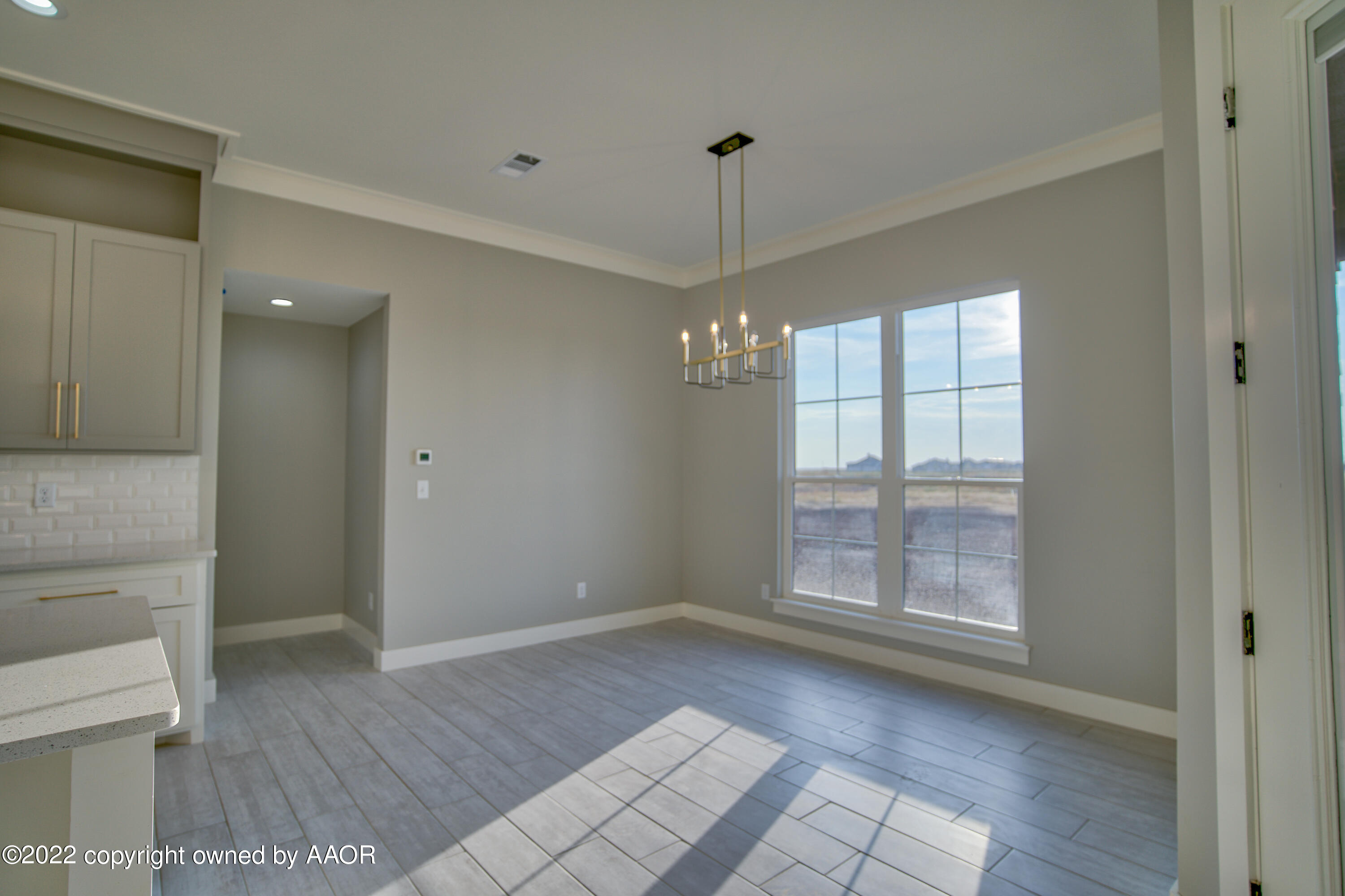 4200 Bobcat Springs Road Amarillo, TX 79119 - Photo 20 of 66 a view of an empty room with a window