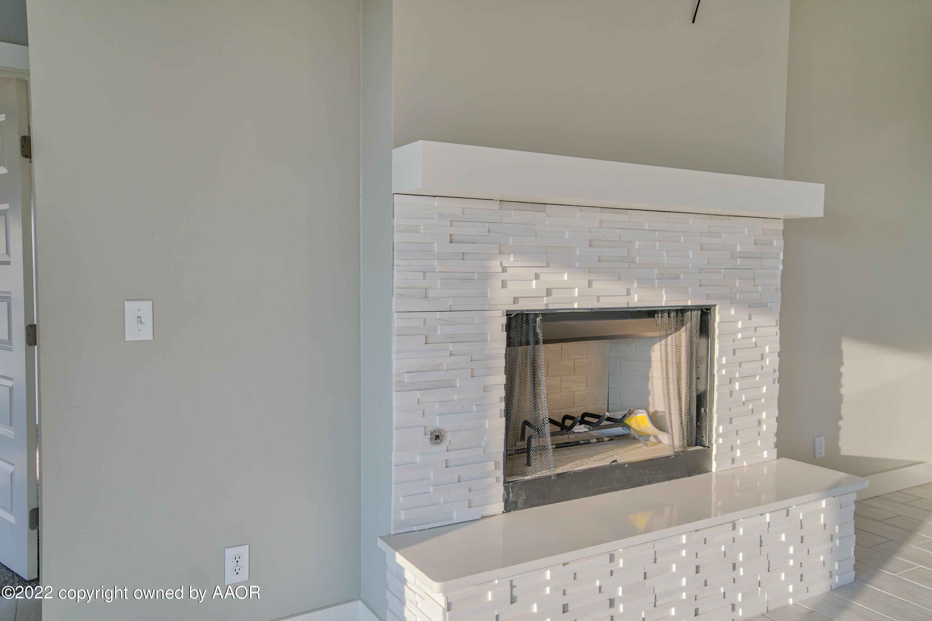 4200 Bobcat Springs Road Amarillo, TX 79119 - Photo 25 of 66 a room with a fireplace