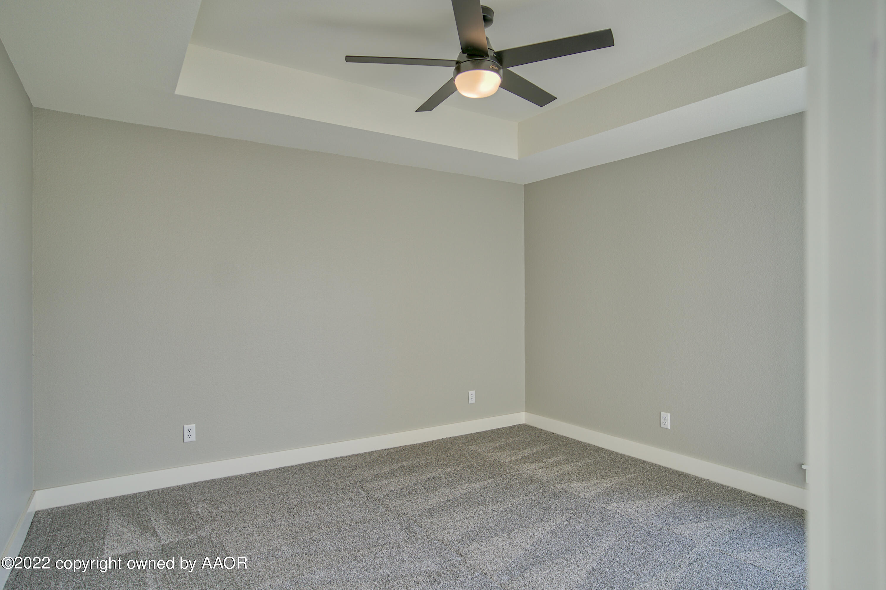 4200 Bobcat Springs Road Amarillo, TX 79119 - Photo 38 of 66 an empty room with a ceiling fan and a window