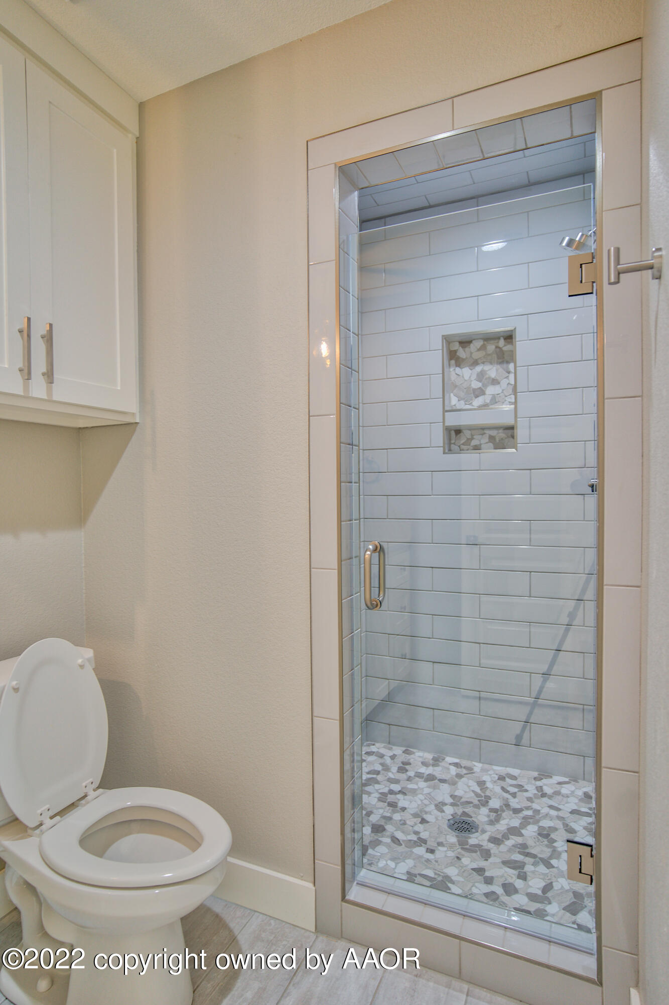 4200 Bobcat Springs Road Amarillo, TX 79119 - Photo 40 of 66 a bathroom with a toilet and a shower