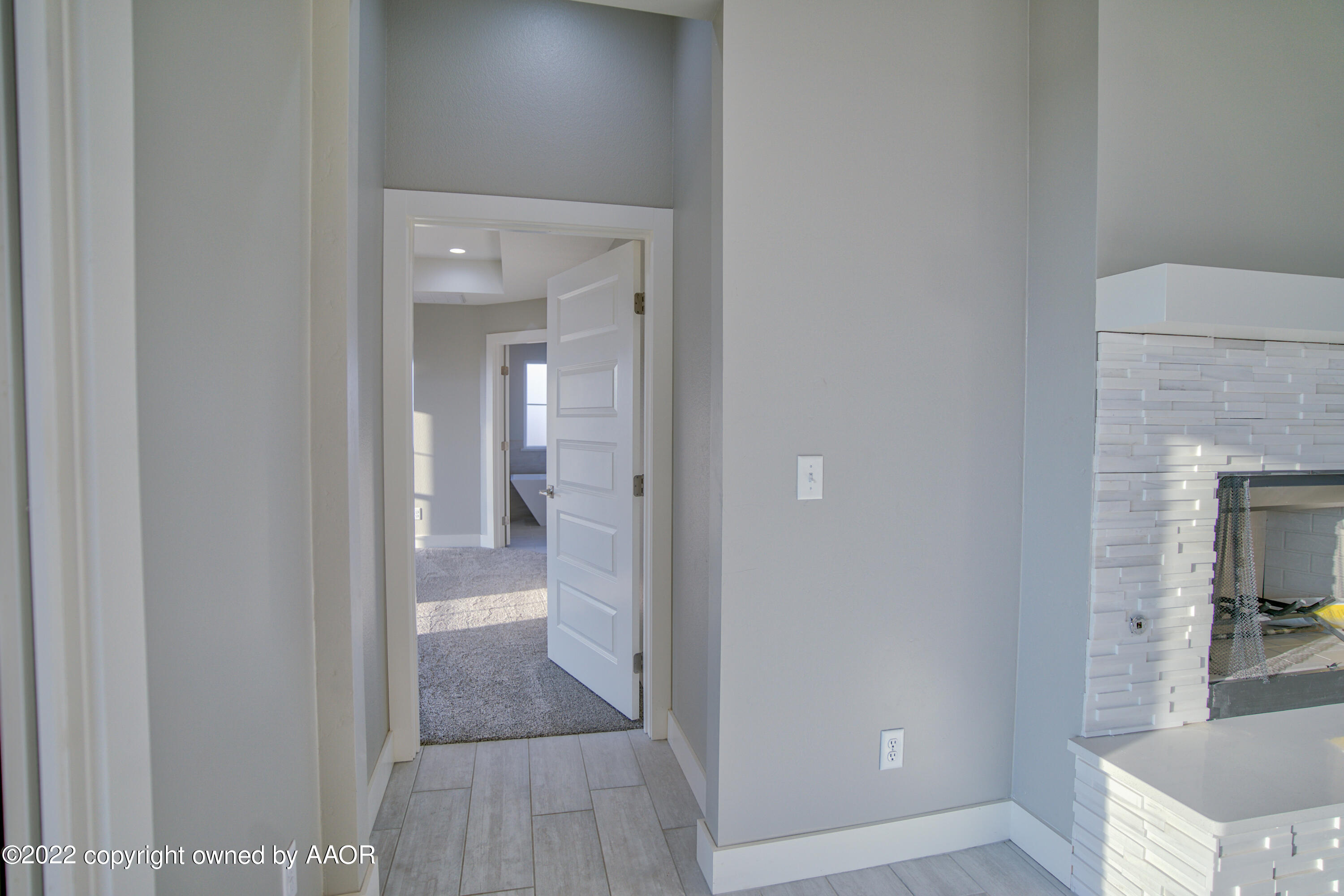 4200 Bobcat Springs Road Amarillo, TX 79119 - Photo 51 of 66 a view of a bathroom from the hallway