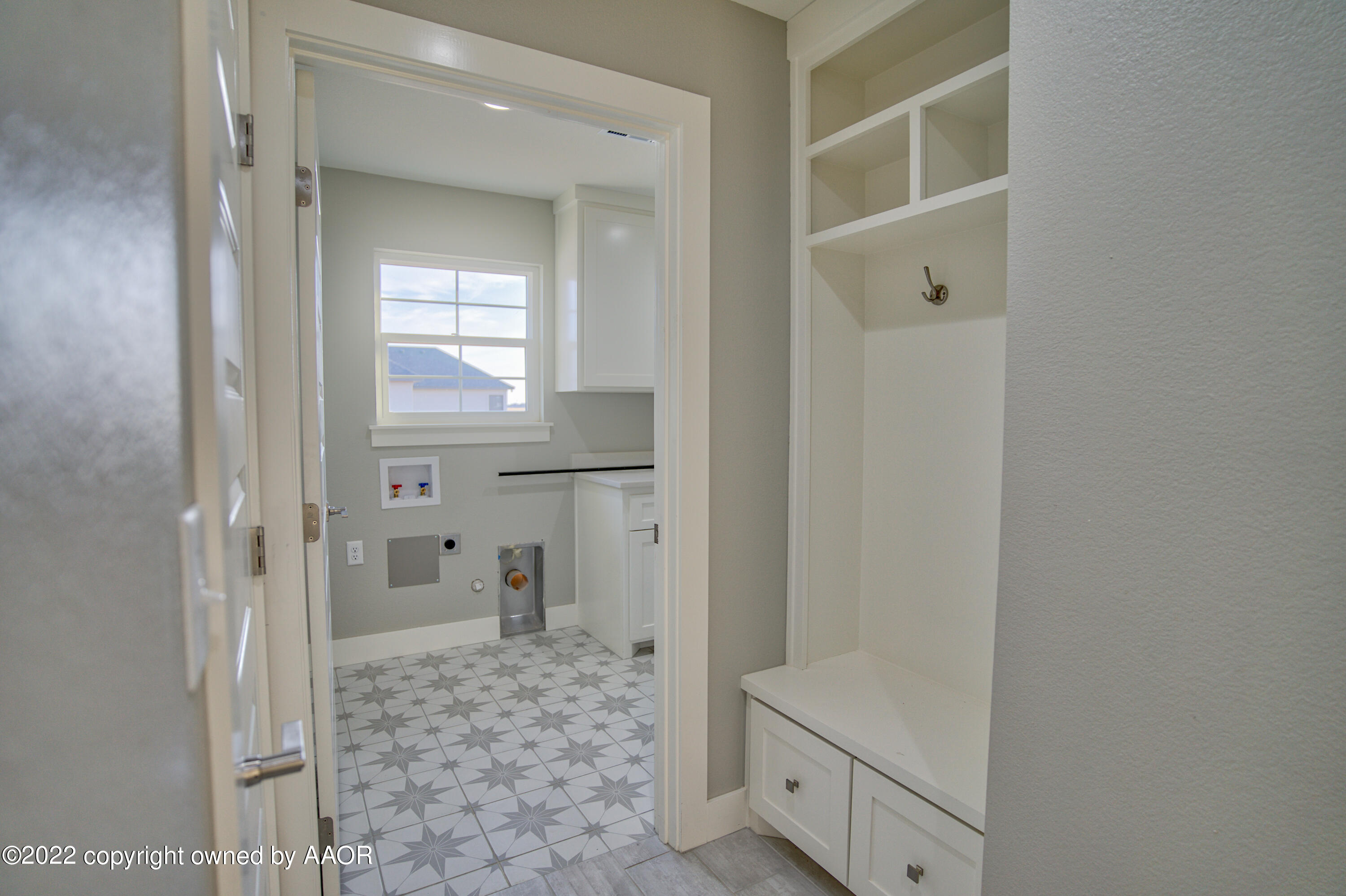 4200 Bobcat Springs Road Amarillo, TX 79119 - Photo 63 of 66 a view of a bathroom with a sink and a mirror