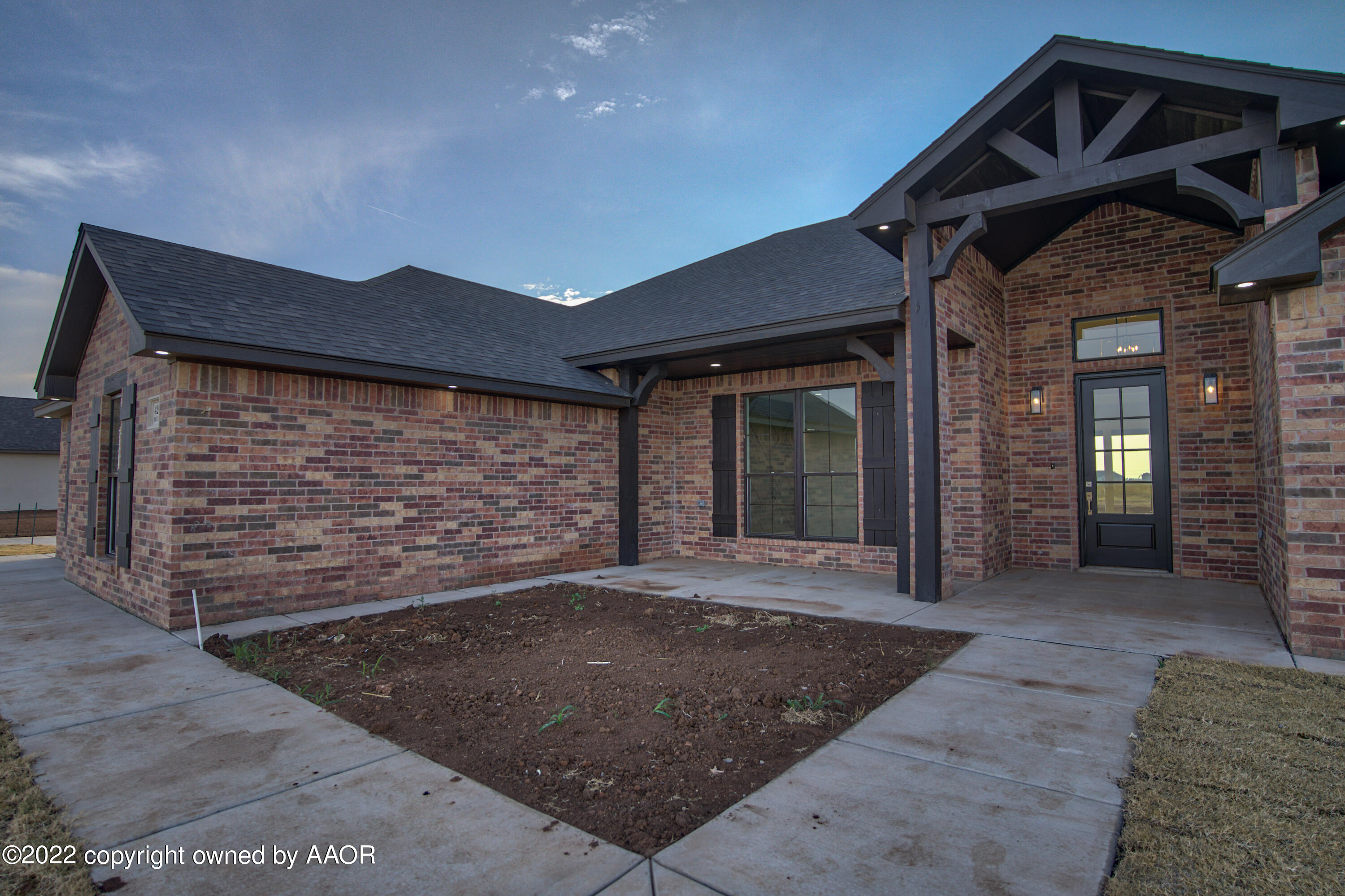 4200 Bobcat Springs Road Amarillo, TX 79119 - Photo 10 of 66 a view of a house with a yard