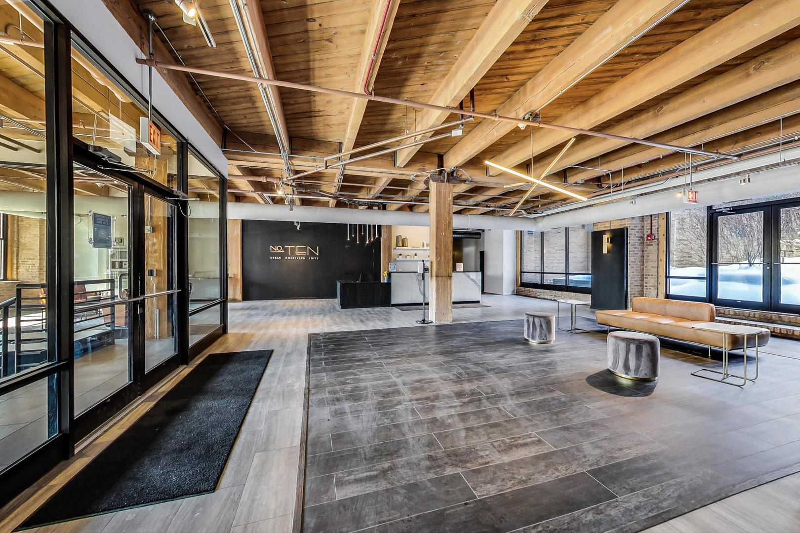 1040 West Adams Street, Unit 222 Chicago, IL 60607 - Photo 2 of 20 a view of a porch with furniture and a yard