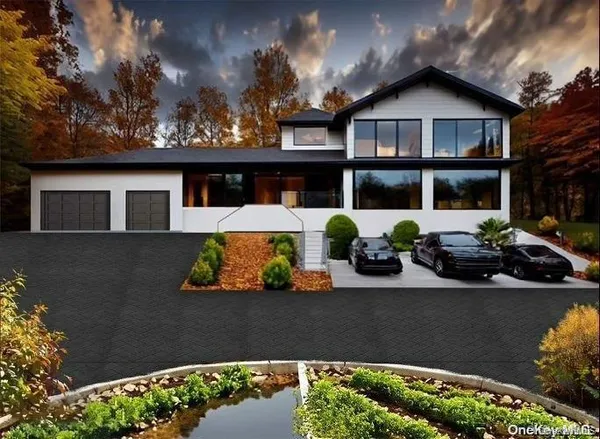 front view of a house with potted plants