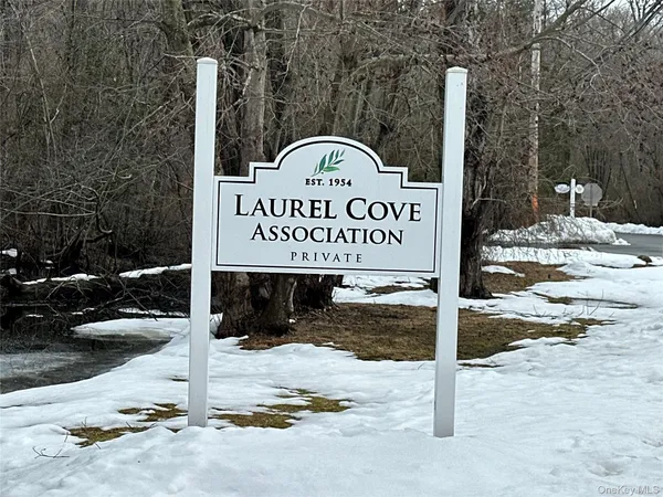 a sign on the side of a street