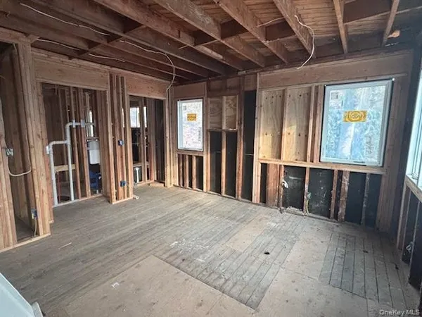 a view of staircase with lots of windows