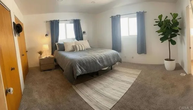 an empty room with windows