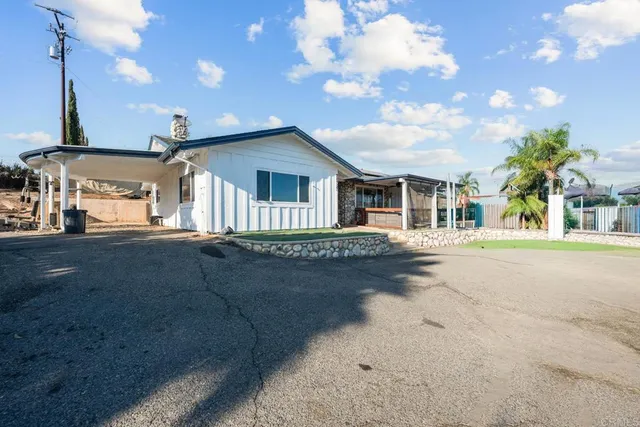 a view of a swimming pool with a lounge chairs