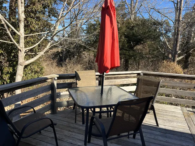 a view of swimming pool with seating space
