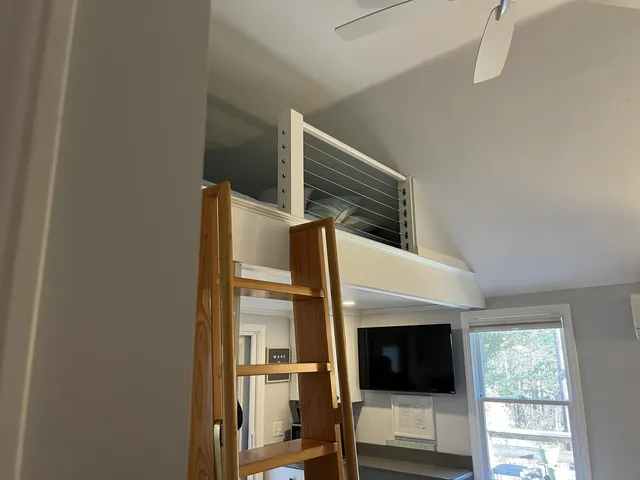 a living room with furniture and a couch