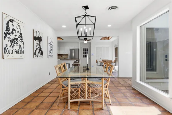 a bathroom with a granite countertop sink mirror and vanity