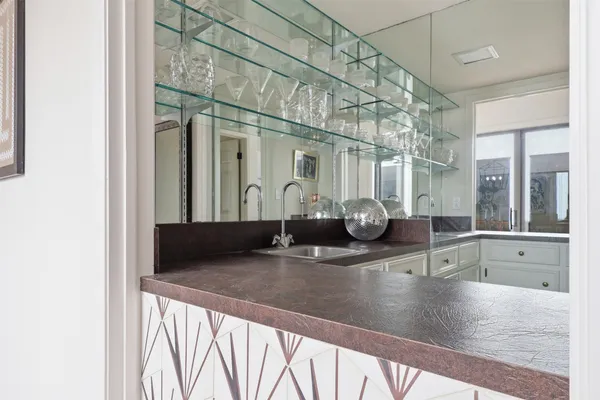 a close view of a sink and a vanity in the bathroom