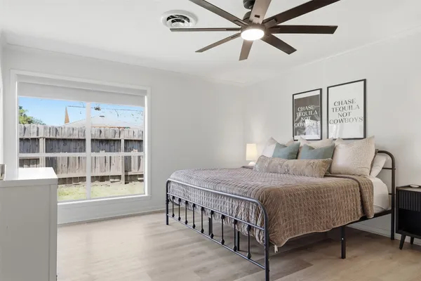 a bathroom with a bathtub and a sink