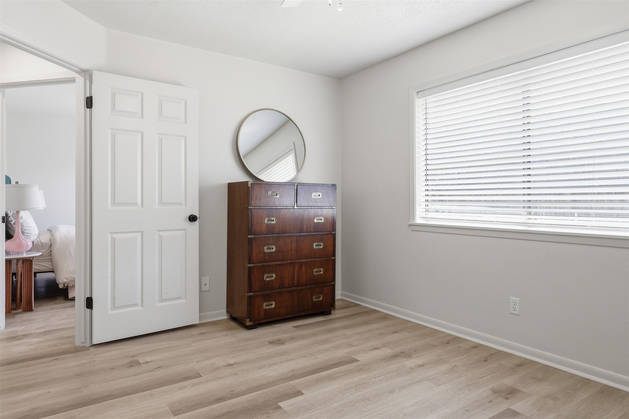 118 Santa Fe Victoria, TX 77904 - Photo 37 of 42 a room with a dresser and a window