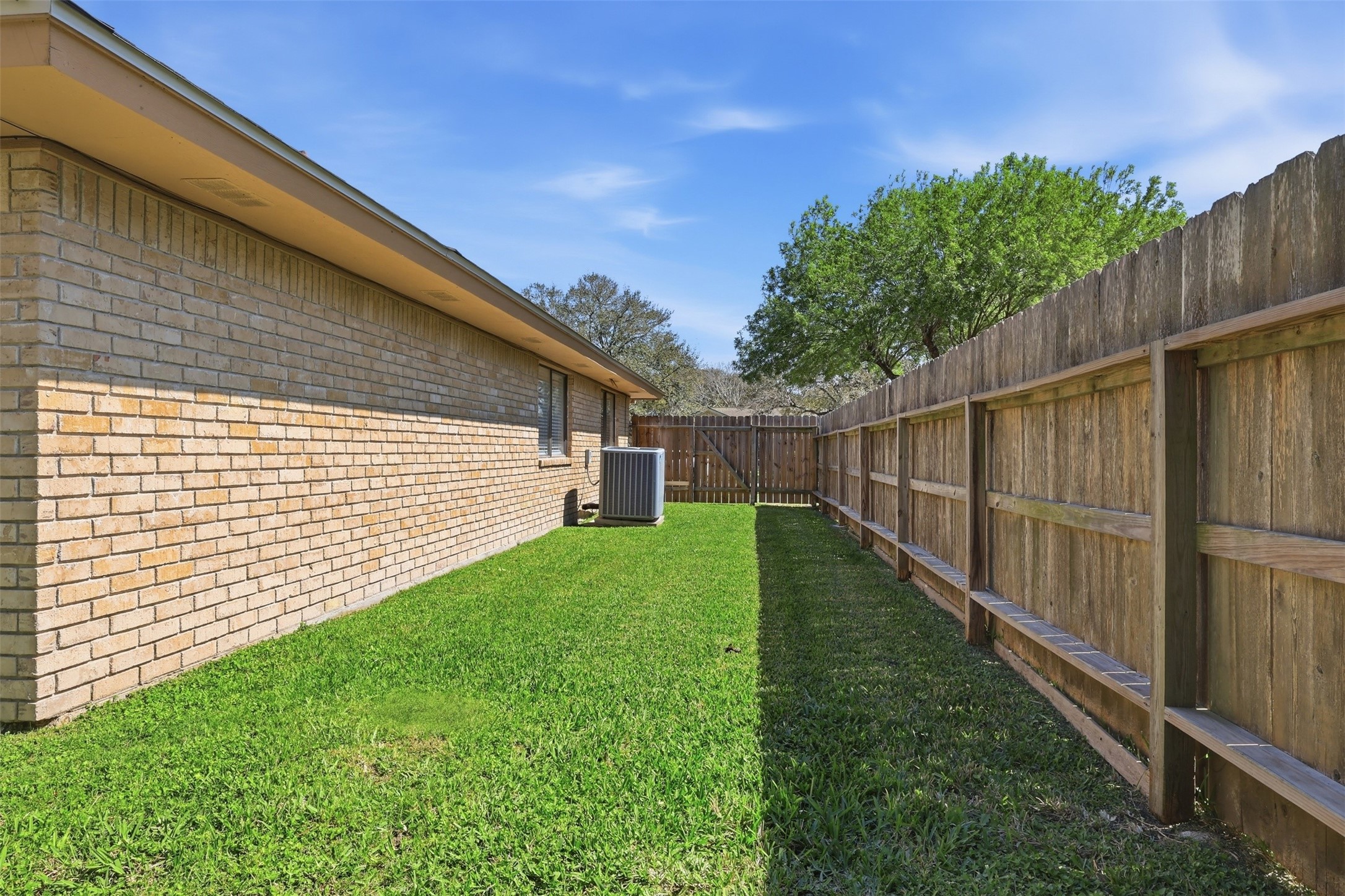 118 Santa Fe Victoria, TX 77904 - Photo 42 of 42 a view of a backyard with a garden