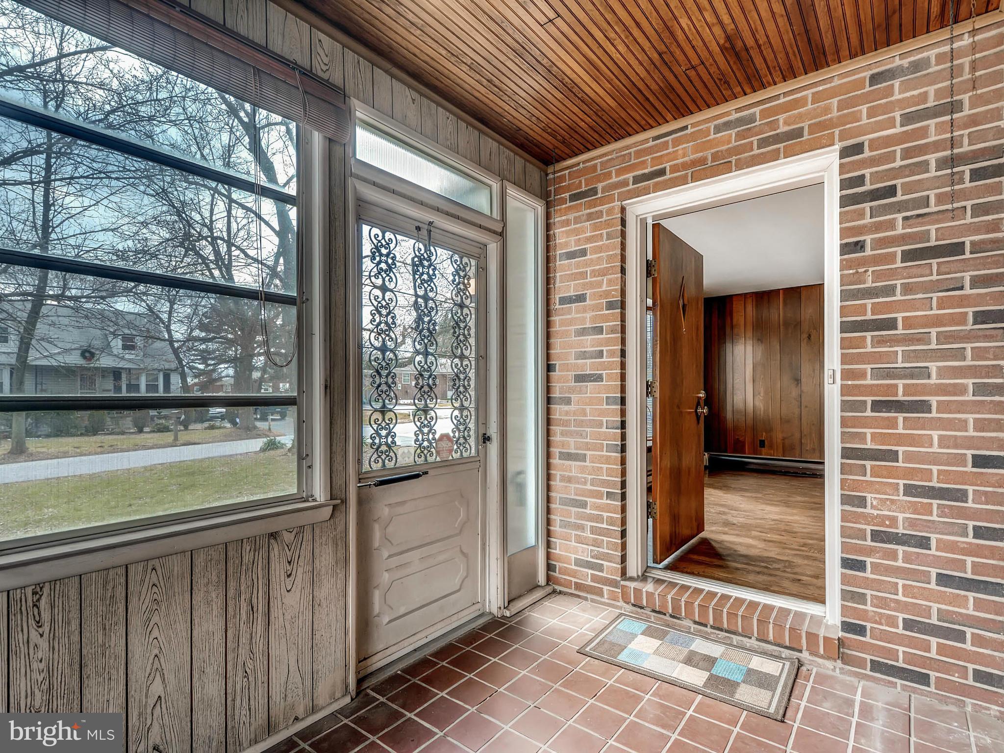 7306 Manchester Road Baltimore, MD 21222 - Photo 5 of 24 a view of a door and wooden floor