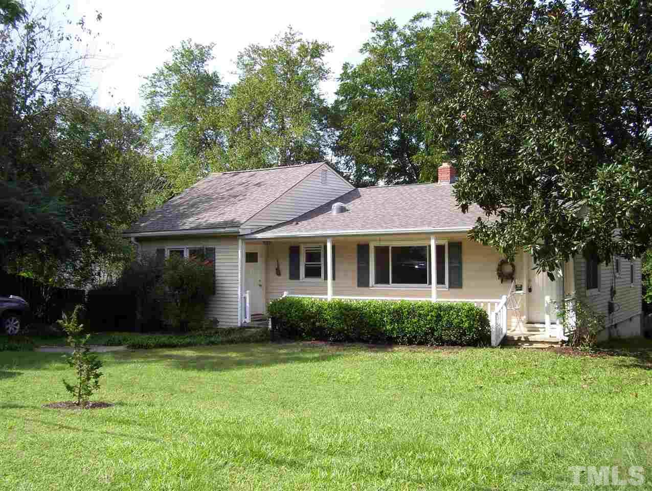 410 Jones Franklin Road Raleigh, NC 27606 - Photo 1 of 17 a front view of a house with a yard